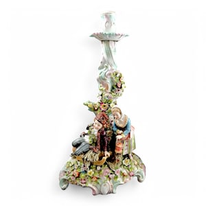 Sitzendorf antique porcelain candlestick depicting Eastern Slavic peasants with sled and lantern, German porcelain c. 1880s