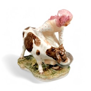Royal Copenhagen porcelain figurine &quot;Girl with Calf&quot; model 779,  by Hr. Thomsen, Juliane Marie polychrome overglaze design