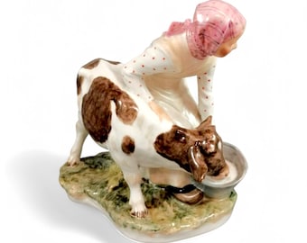 Royal Copenhagen Woman Feeding Cow, Porcelain, #779, Designed by