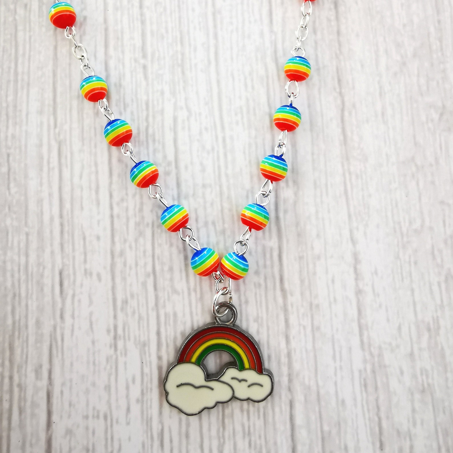 All the rainbows necklace with rainbow beads and an enamel Etsy