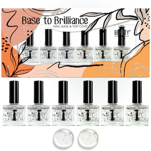 May include: A set of six clear nail polish bottles with black caps and a gold crown logo. The bottles are arranged in two rows of three. The bottles are labelled "Beauty" and the text "Base to Brilliance Nail Base & Top Coat" is visible at the top of the image.
