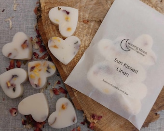 Sun kissed linen fragranced wax melt hearts, fresh and clean wax melts, luxurious botanical wax melts, strong scented and long lasting aroma