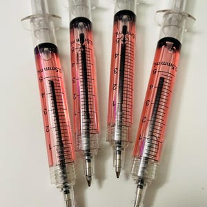 Set van 4 stuks nieuwigheidsspuitpennen, gezondheidszorgmedewerker cadeau kantoorpennen, vloeibare spuitpennen voor medisch personeel, nieuwigheidspennen