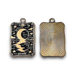 Set van 4 zwart en goud geëmailleerde tarotkaarthangers, zon-maan-sterren-dier tarotkaartbedels