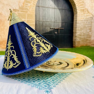 May include: A gold serving tray with a blue and gold embroidered conical lid. The lid has a decorative design with gold embroidery on a dark blue background.