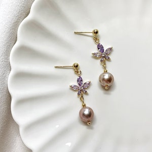 Purple Near-Round Pearl Dangle Earrings. Freshwater Baroque Pearl Drop Earrings. Purple Crystal Flowers Earrings. Dainty Flower Earrings.