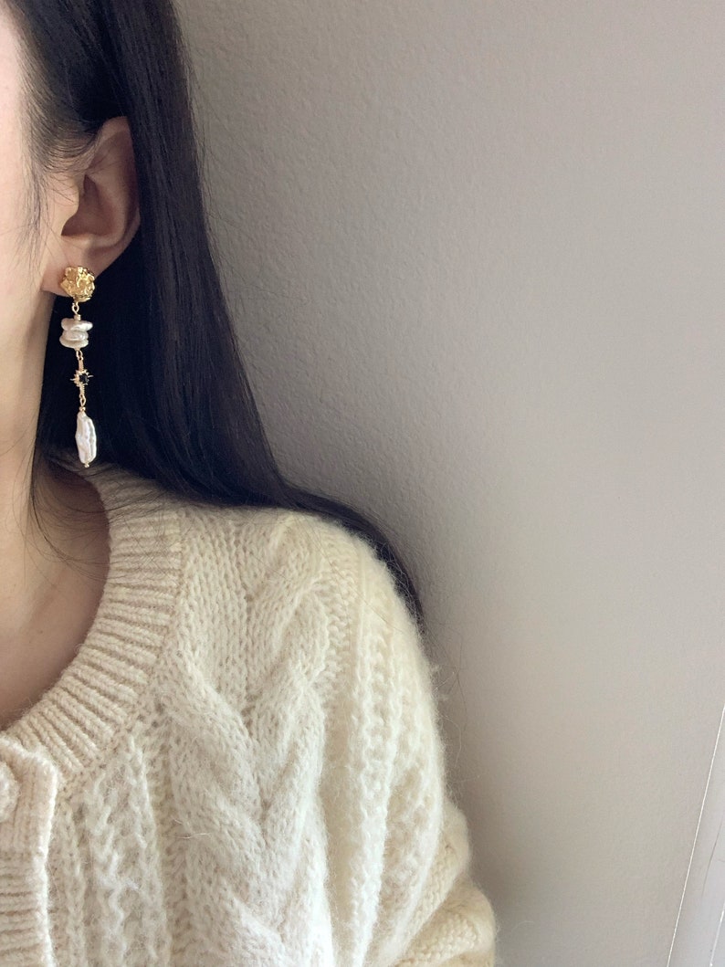 Freshwater Keshi Pearl Earring. White Biwa Pearl Dangle Earring. Mismatched Pearl Drop Earring. Long Pearl Drop Earring. Black Star Earring. image 5