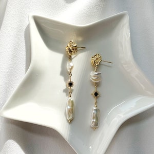 Freshwater Keshi Pearl Earring. White Biwa Pearl Dangle Earring. Mismatched Pearl Drop Earring. Long Pearl Drop Earring. Black Star Earring. image 7