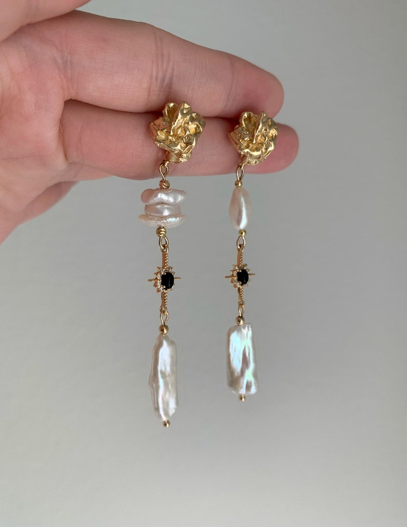 Freshwater Keshi Pearl Earring. White Biwa Pearl Dangle Earring. Mismatched Pearl Drop Earring. Long Pearl Drop Earring. Black Star Earring. image 8