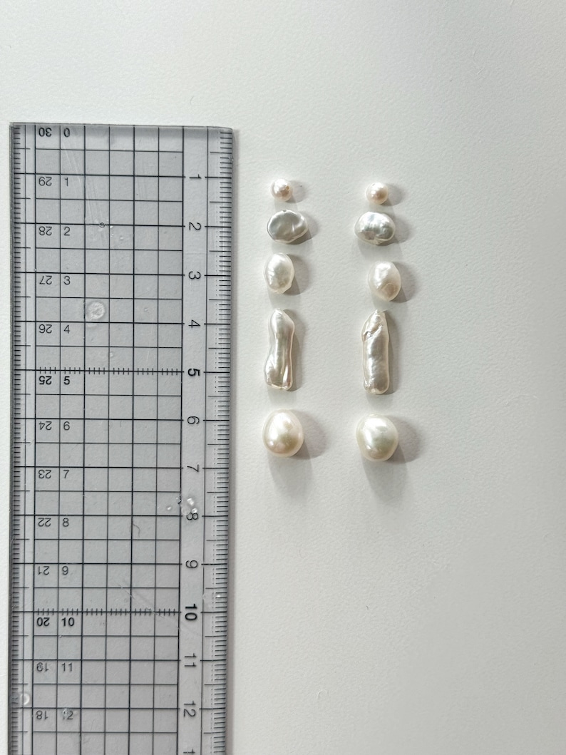 Freshwater Keshi Pearl Earring. White Biwa Pearl Dangle Earring. Mismatched Pearl Drop Earring. Long Pearl Drop Earring. Black Star Earring. image 10