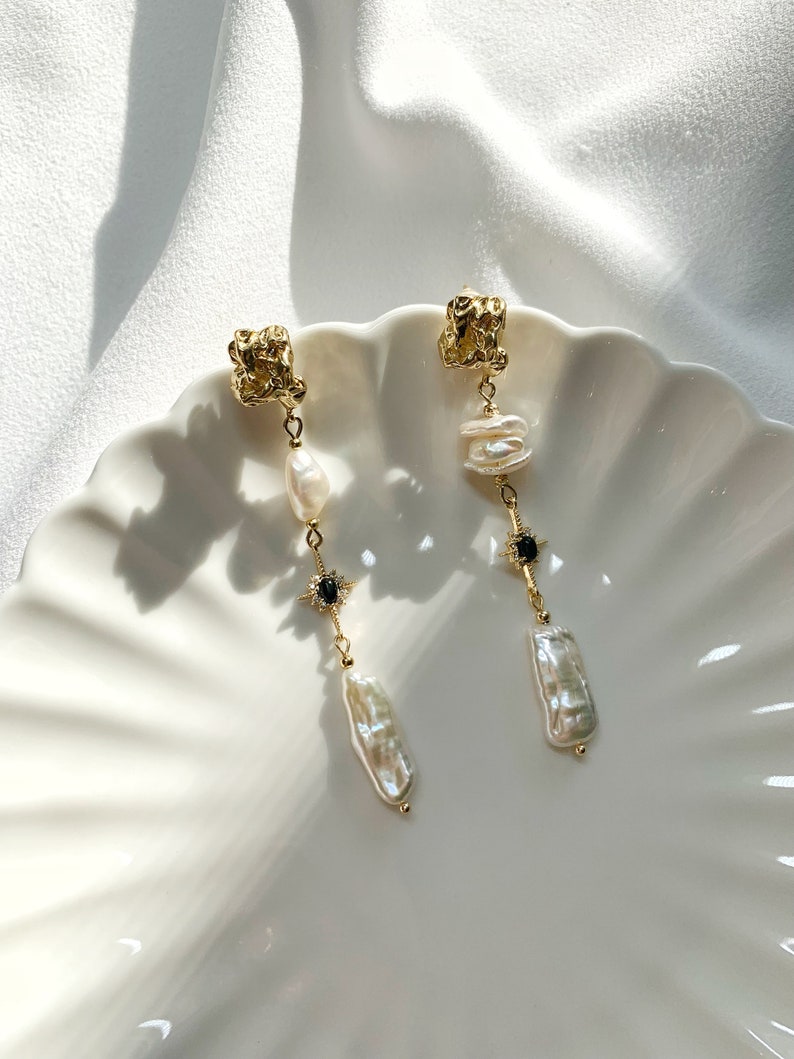 Freshwater Keshi Pearl Earring. White Biwa Pearl Dangle Earring. Mismatched Pearl Drop Earring. Long Pearl Drop Earring. Black Star Earring. image 3