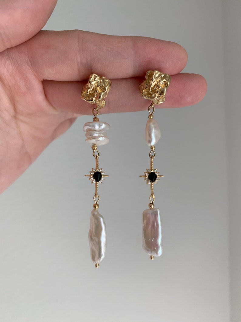 Freshwater Keshi Pearl Earring. White Biwa Pearl Dangle Earring. Mismatched Pearl Drop Earring. Long Pearl Drop Earring. Black Star Earring. image 6