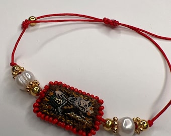 Benedikt Rotes Armband. Pulsera roja de San Benito