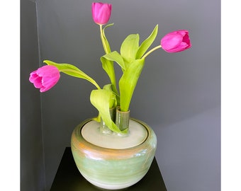 vase, with a few flowers a decorative whole.