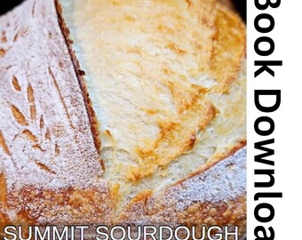 May include: A close-up of a freshly baked sourdough loaf with a golden brown crust. The bread is dusted with flour and has a slightly cracked surface. The text "SUMMIT SOURDOUGH From Culture to Crust BY KRISTY CROSBIE" is visible at the bottom of the image.