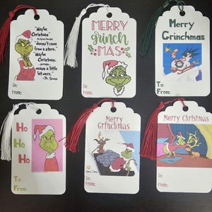 Étiquettes vintage en papier cartonné Grinch pour cadeaux de Noël.
