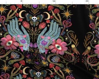 May include: A black background with a symmetrical pattern of colorful flowers, owls, snakes, butterflies, moons, stars, and hands. The hands are blue and have a variety of symbols on them. The flowers are pink and red with yellow centers. The owls are white with brown markings. The snakes are green and brown. The butterflies are black and white with red accents. The moons are white and the stars are yellow.