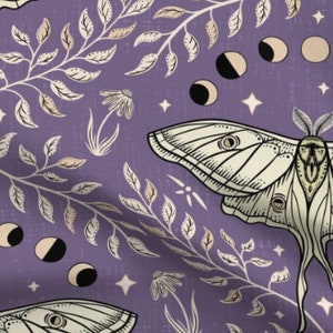 May include: A seamless pattern featuring white moths with intricate wing details on a purple background. The pattern also includes delicate branches with leaves and crescent moons.
