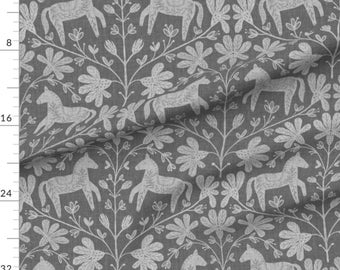 May include: Gray fabric with a white repeating pattern of stylized horses and flowers. The fabric has a subtle linen texture.