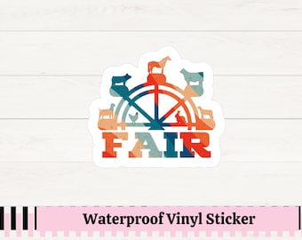Puede incluir: Una pegatina de vinilo colorida de estilo retro con un diseño de noria. La rueda está rodeada de siluetas de animales de granja, incluyendo una vaca, un cerdo, un pollo, un conejo y un caballo. La palabra "FAIR" está escrita en letras grandes y negritas debajo de la rueda.