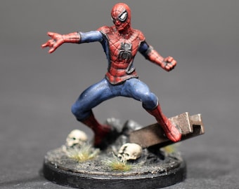 Figuras pintadas de Marvel Crisis Protocol con tarjeta de personaje.