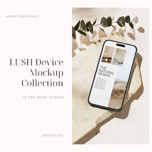 May include: A smartphone with a black bezel displays a webpage with the text "THE NATURAL DESIGN." The phone rests on a light-colored, textured surface, with a sprig of greenery in the background. The text "LUSH Device Mockup Collection" is also visible.