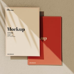 May include: A mockup of a white card with the word "Mockup" in black text. The card is on a beige background with a shadow. There is a red card behind the white card.