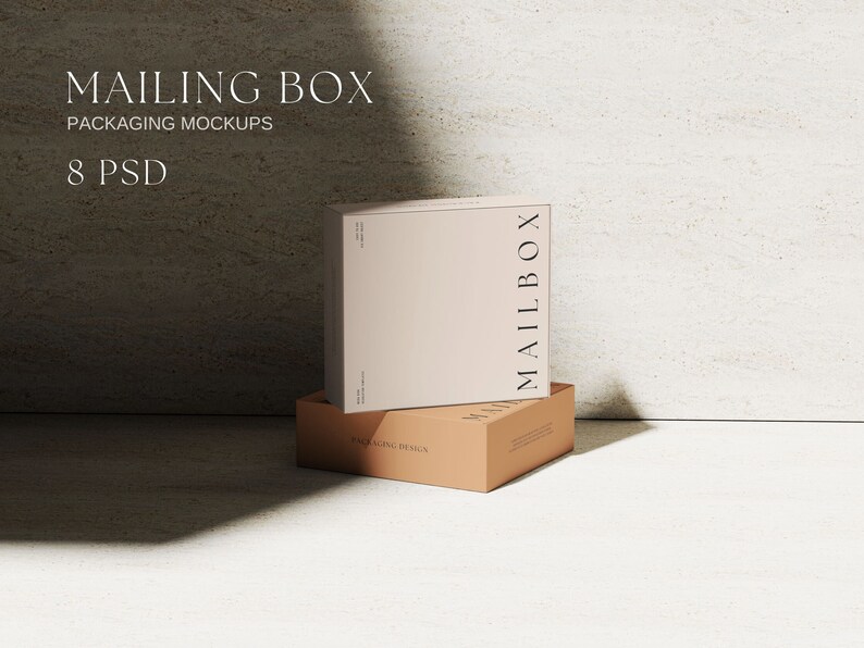 May include: A light beige square mailing box with the word MAILBOX printed vertically in black on the side, resting on a flat tan cardboard box base. The text MAILING BOX PACKAGING MOCKUPS 8 PSD is visible in the upper left corner of the image.