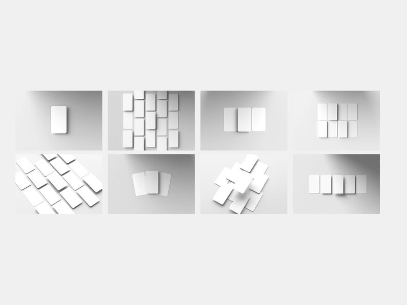 Pode incluir: V&aacute;rios cart&otilde;es retangulares brancos com cantos arredondados dispostos em diferentes configura&ccedil;&otilde;es sobre um fundo cinza claro. Os cart&otilde;es est&atilde;o em branco, sugerindo uso para apresenta&ccedil;&atilde;o ou design. Sombras suaves.