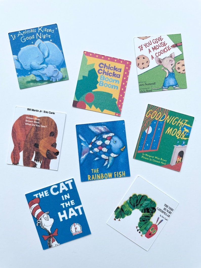 May include: A collection of ten miniature children's books, including "The Very Hungry Caterpillar", "Goodnight Moon", "The Cat in the Hat", "Brown Bear, Brown Bear, What Do You See?", "If Animals Kissed Good Night", "Chicka Chicka Boom Boom", "The Rainbow Fish", and "If You Give a Mouse a Cookie".