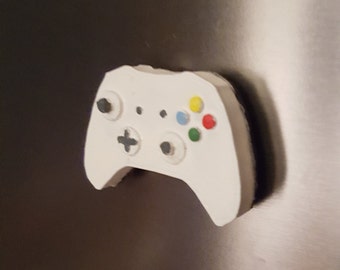 Kleine gamecontroller-magneet