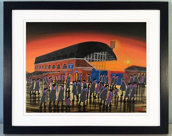 May include: A painting of a crowd of people walking away from a stadium at sunset. The stadium is red brick with a blue and white sign that says "3". The sky is orange and red, and the people are wearing blue and red clothing.