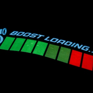 May include: A blue turbocharger graphic with a green and red progress bar that reads "BOOST LOADING..."