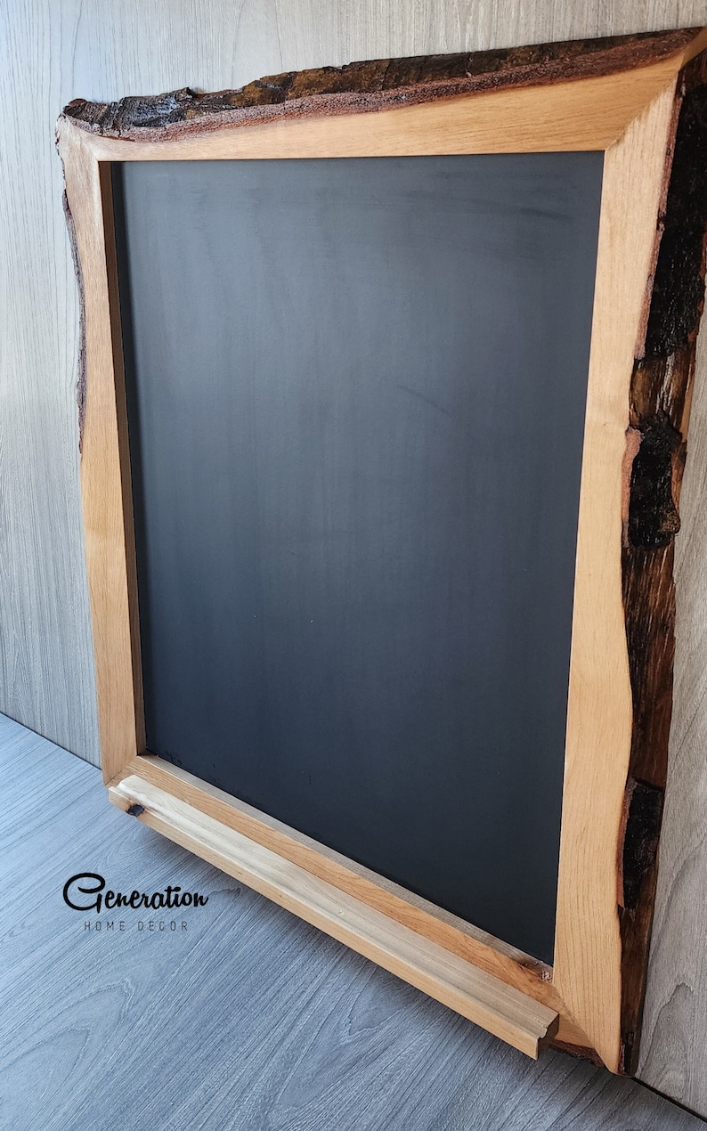 Alder live edge Chalkboard with small shelf at base to hold chalks.