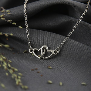 Double hearts necklace in sterling silver, two hearts necklace, linked hearts necklace, two open hearts necklace,intertwined hearts necklace