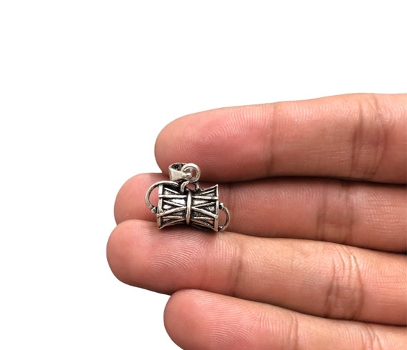 Silver on sale damru pendant
