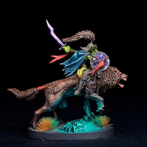 May include: A green goblin riding a brown wolf with a purple sword and a red and purple shield. The wolf has a red band around its tail and a skull on its back.