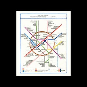 May include: A vintage Moscow Metro map featuring a colorful schematic of subway lines and stations. The map includes text in Russian, with a circular central design and radiating lines in various colors. The title reads "Moscow Metro".