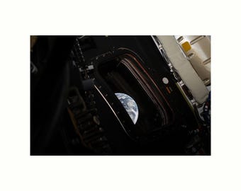 View of Earth through Spacecraft Window Leaving Orbit Artemis II Photo Art Print