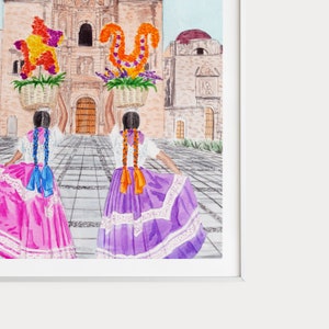May include: Two people in colourful dresses and long braids walk away from the camera, carrying baskets of flowers in front of a large building.