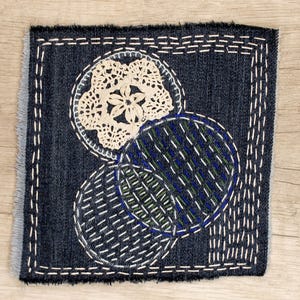 Denim boro patch Sashiko stitching upcycled quilt Visible mending