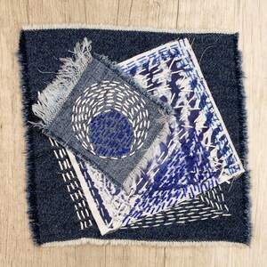 Indigo blue denim boro patch Visible mending Sashiko stitching upcycled quilt