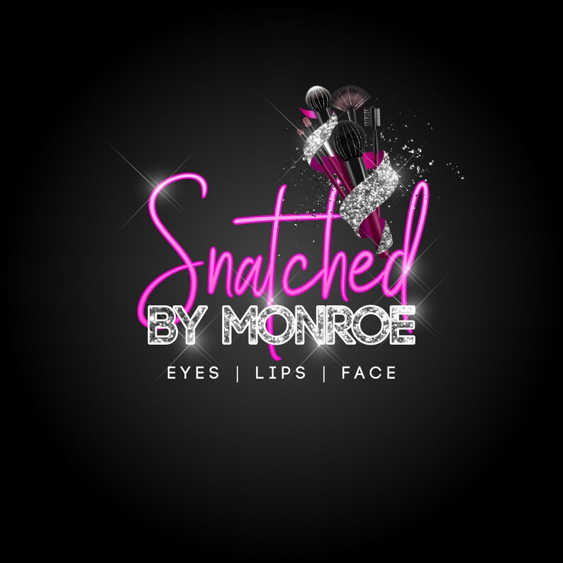 May include: A pink neon sign with the text "Snatched by Monroe" and the words "Eyes | Lips | Face" below. The sign is surrounded by silver glitter and makeup brushes.