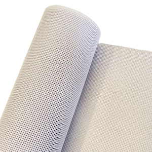 May include: A roll of white mesh fabric. The fabric is woven with a fine, even grid pattern.