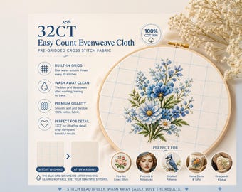May include: 32CT Easy Count Evenweave Cloth, a 100% cotton pre-gridded cross stitch fabric. The fabric features a blue water-soluble grid every 10 stitches. A wooden embroidery hoop holds the fabric, which displays a blue and white floral design.