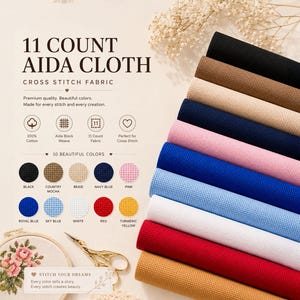 May include: A collection of 11 count Aida cloth for cross stitch in ten colors including black, mocha, beige, navy, pink, royal blue, sky blue, white, red, and yellow. The text reads 11 COUNT AIDA CLOTH and lists features like 100% cotton.