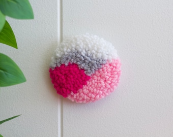 Liten rosa cirkelmatta