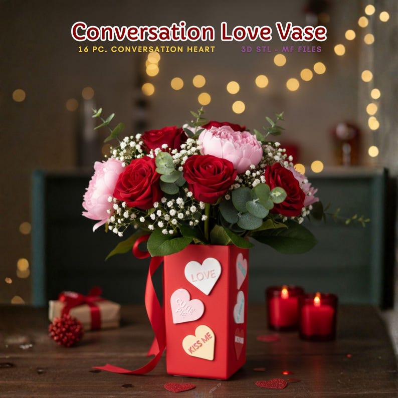 May include: A red vase with heart-shaped stickers bearing the words "Love", "Cutie Pie", and "Kiss Me" contains a floral arrangement of red roses, pink peonies, and foliage. The text "Conversation Love Vase" is visible.