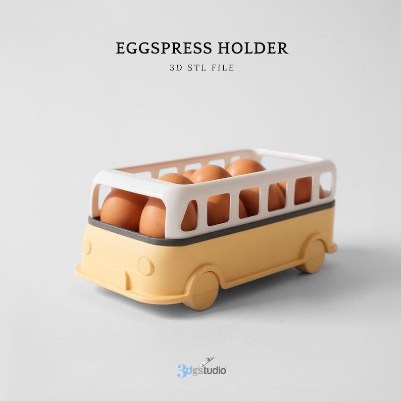 May include: A yellow and white egg holder shaped like a bus, filled with brown eggs. The text "EGGSPRESS HOLDER" and "3D STL FILE" are printed on the top. The bottom of the bus has wheels and a front bumper.