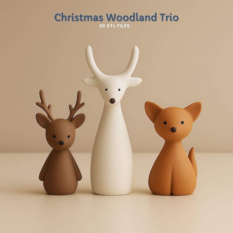 May include: Three minimalist Christmas figurines: a brown deer, a white deer, and a tan fox. The text "Christmas Woodland Trio" and "3D STL FILES" are at the top. The figurines have simple, rounded shapes and are set against a neutral background.